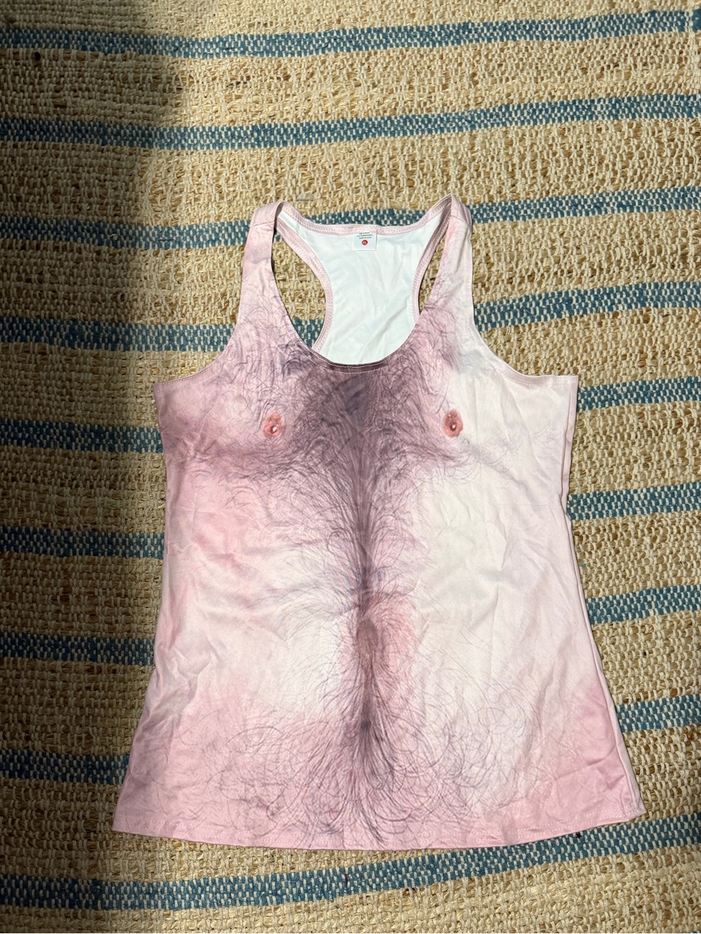 graphic print of a hairy chest.